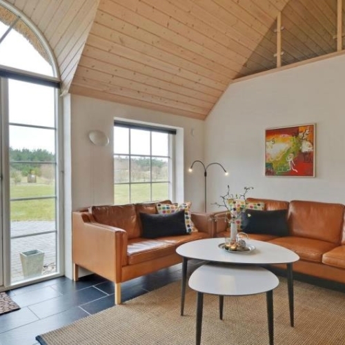 Hoveentreprise af sommerhus stue